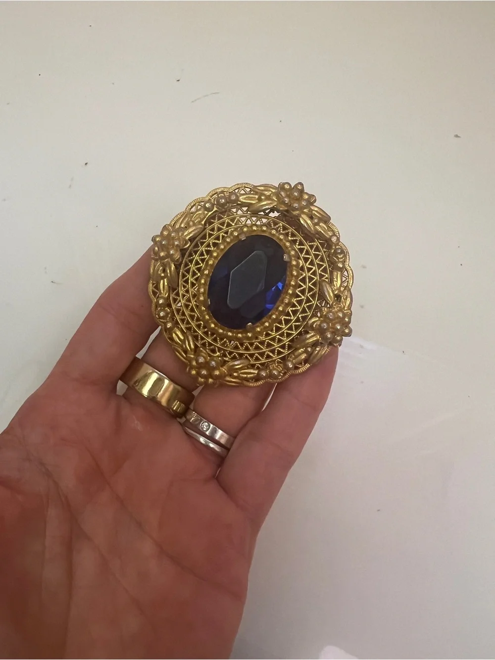 Vintage Gold Tone Brooch with Deep Blue Center Stone